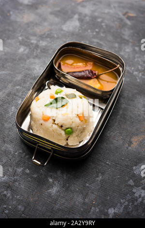 Upma / uppuma sambar in lunch box or tiffin Stock Photo