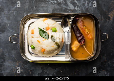 Upma / uppuma sambar in lunch box or tiffin Stock Photo