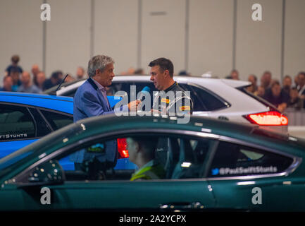 Paul Swift stunt driver, MC'd by Tiff Needell at London Motor Show May 2019, Excel London. Ford Mustang Stock Photo