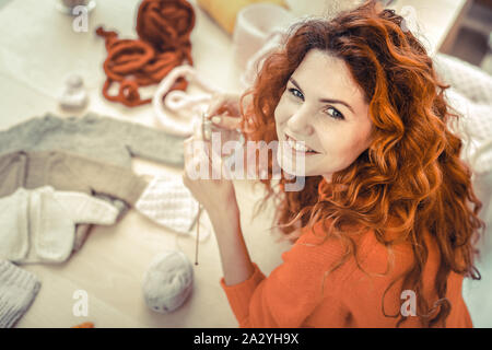 Pretty red haired girl looking straight at camera Stock Photo