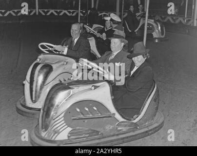 Amusement park in the 1940s. No matter old or young, bumper cars are one of the favorite attractions. Pictured a older couple driving and having fun. Sweden 1940s. Stock Photo