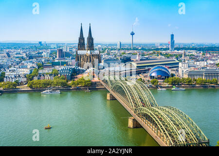 Cologne, Germany: Beautiful panoramic aerial landscape of the gothic catholic Cologne cathedral, Hohenzollern Bridge and the River Rhine. Stock Photo