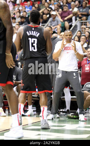 October 3, 2019 - Houston Rockets guard James Harden #13 and Houston Rockets guard Russell Westbrook #0 danced a little after a big play during a preseason game between the Los Angeles Clippers and the Houston Rockets at the Stan Sheriff Center on the campus of the University of Hawaii at Manoa in Honolulu, HI - Michael Sullivan/CSM. Stock Photo