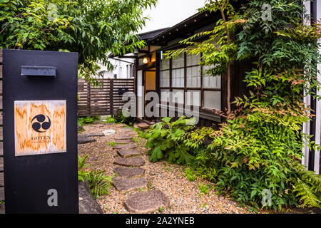 Japanese Architecture and Design in Fujinomiya, Japan. A quiet path leads to the typical accommodation in the town of Fujinomia Stock Photo