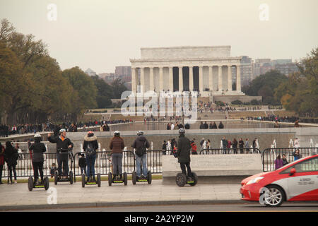 People visiting the National Mall in Washington DC, USA. The Lincoln Memorial in the background. Stock Photo