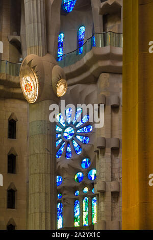 Barcelona, Catalonia, Spain - November 19, 2018: Columns on the background of stained glass windows in the interior of the Temple Expiatori de la Sagr Stock Photo