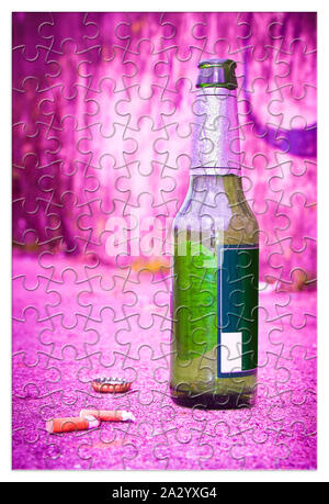 Puzzle of a bottle of beer resting on the ground - Free themselves from alcohol addiction - concept image Stock Photo