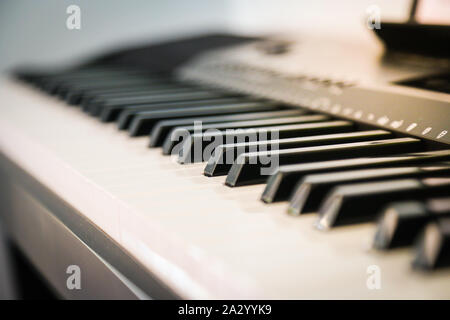 Piano, keyboard keys shot across the piano keys Stock Photo