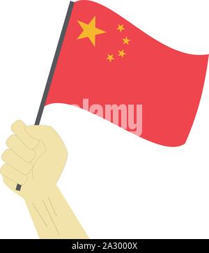 Hand holding and raising the national flag of China Stock Vector