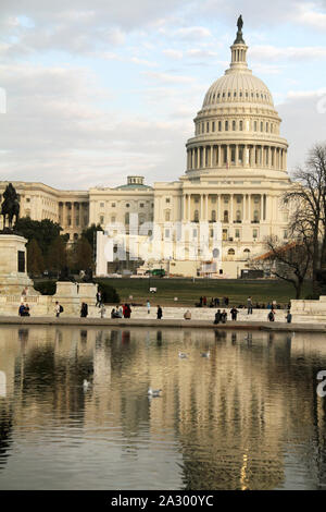 The Capitol Building and the Capitol Reflecting Pool at the eastern end of the National Mall in Washington, DC. Stock Photo