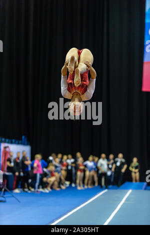 Birmingham, England, UK. 28 September 2019. Lily May Titley (Milton Keynes Gymnastics Club) in action during the Trampoline, Tumbling and DMT British Championship Qualifiers at the Arena Birmingham, Birmingham, UK. Stock Photo