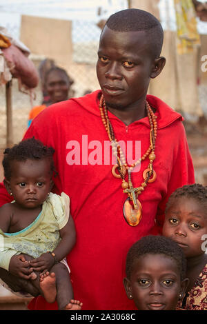 Central African Republic CAR Bangui Father with children and a cross Photo Jaco Klamer 21-05-2014 Stock Photo