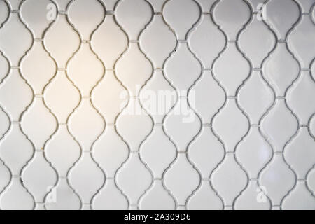 White tiles on kitchen backsplash - white wall tiles Stock Photo