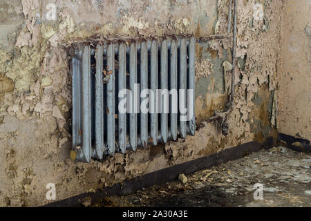 Old heating after water damage Stock Photo