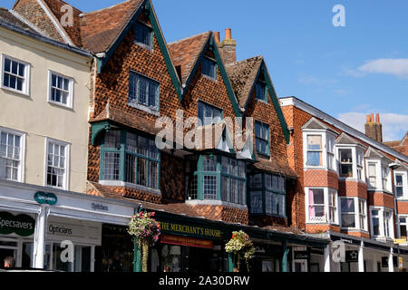 View of rooftops along the High St of Marlborough, a Market Town In Wiltshire UK. The Merchants House Stock Photo