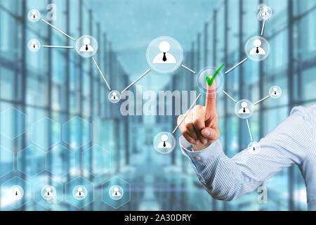 Businesswoman touching touch screen with her finger. Human resources recruitment and people networking concept Stock Photo