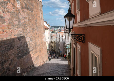 Mala Strana, Prague, Czech Republic. Thunovska street, a narrow cobbled street in the historic district of Mala Strana. Stock Photo