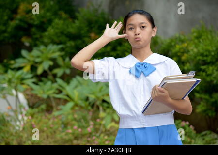 Asian Female Student Making Funny Faces Stock Photo