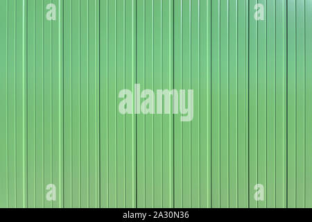 Wall made of green flat aluminum profile Stock Photo