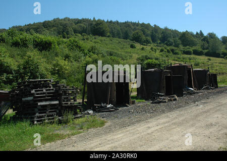 burning charcoal in the Bieszczady Mountains, Poland Stock Photo