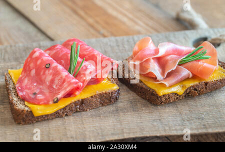 Spanish sandwiches with salchichon anb jamon close-up Stock Photo