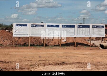 Mombasa Road in Kenya, Summer 2015 (km 80): Information Panel in Chinese on the Project for the new Chinese-built Railway Stock Photo