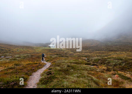 Hutchison Memorial Hut bothy on Glen Derry route in the Cairngorms National Park that takes you up to Ben Macdui the highest mountain in the park. Stock Photo