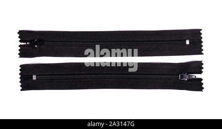 Closed black zipper isolated on white background. Black zipper for tailor sewing. Stock Photo