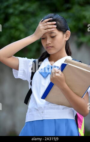 A Female Student And Memory Loss Stock Photo