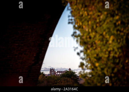 Whitby Abbey ruins seen through the arches of the Larpool Viaduct Stock Photo