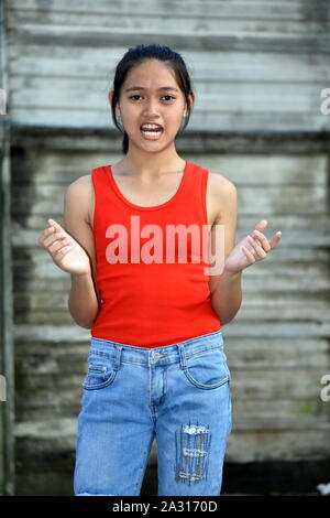 A Stressful Cute Asian Youth Stock Photo