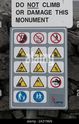 Close-up of warning signs at a prehistoric castle, Dun Aonghasa, Kilronan, Inishmore, Aran Islands, County Galway, Republic of Ireland Stock Photo