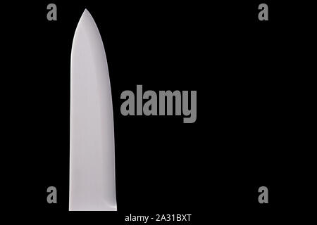 Ceramic kitchen knife blade isolated against a black background Stock Photo