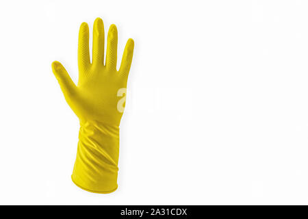 Yellow Household Rubber Glove single for cleaning disposable pattern bright coloured Stock Photo