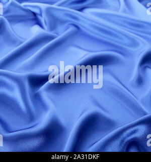 Blue shiny satin background. Stock Photo
