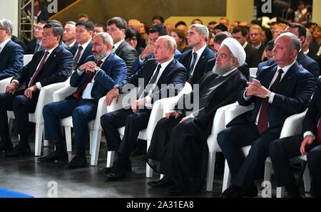 Regional leaders from the former Soviet states meet during the Supreme Eurasian Economic Council conference October 1, 2019 in Yerevan, Armenia. Sitting left to right are: Kyrgyzstan President Sooronbay Jeenbekov, Armenian Prime Minister Nikol Pashinian, Russian President Vladimir Putin, Iranian President Hassan Rouhani and Moldovan President Igor Dodon. Stock Photo