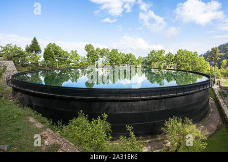 Water Storage Tank for the community of Ayubia, Donga Gali, Pakistan. Stock Photo