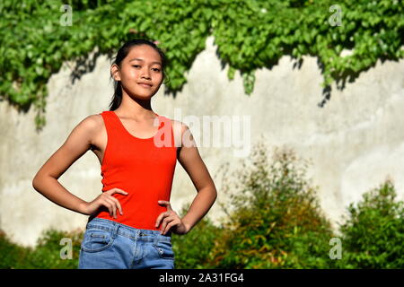 A Skinny Cute Diverse Teenager Girl Stock Photo