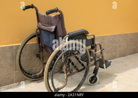 Bunch of empty wheelchairs parked in hospital Stock Photo