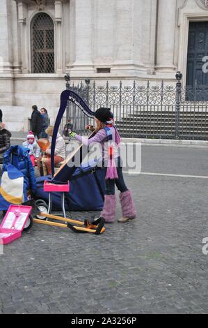Harp player in Rome Stock Photo
