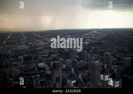 thunderstorm and rainclouds over western chicago at sunset  chicago illinois united states of america Stock Photo