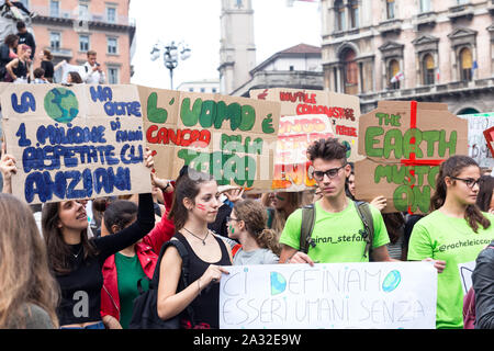 Milan,Italy - 27 September, 2019: Milano Duomo Square, Global strike for climate change. Students voice their friday for future, with Greta Thunberg Stock Photo