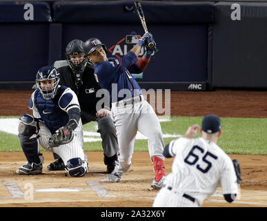 Bronx, USA. 04th Oct, 2019. Minnesota Twins Jorge Polanco hits a solo home run in the first inning of game one of the American League Division Series against the New York Yankees at Yankee Stadium on Friday, October 4, 2019 in New York City. Photo by John Angelillo/UPI Credit: UPI/Alamy Live News Stock Photo
