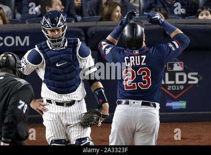 Bronx, USA. 04th Oct, 2019. Minnesota Twins Nelson Cruz celebrates after he hits a solo home run in the 3rd inning of game one of the American League Division Series against the New York Yankees at Yankee Stadium on Friday, October 4, 2019 in New York City. Photo by John Angelillo/UPI Credit: UPI/Alamy Live News Stock Photo