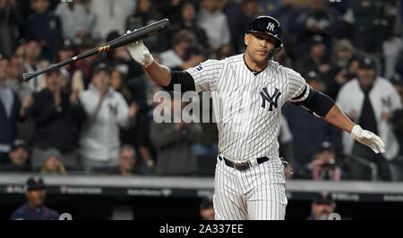Bronx, USA. 04th Oct, 2019. New York Yankees batter Giancarlo Stanton reacts after he walks against the Minnesota Twins in the third inning of the 2019 MLB Playoffs American League Division Series Game 1 at Yankee Stadium in New York City on October 4, 2019. Photo by Ray Stubblebine/UPI Credit: UPI/Alamy Live News Stock Photo