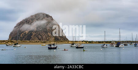 California, USA, 09 Jun 2013: Misty morning at Morro Bay with anchored yachts. Stock Photo