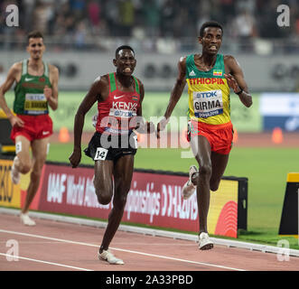 Doha, Qatar. 04th Oct, 2019. Conseslus Kipruto of Kenya and Lamche Girma of Ethiopia race at the finishing line in the 3000m steeplechase on day 8 of the 17th IAAF World Athletics Championships 2019, Kalifa International Stadium. Credit: SOPA Images Limited/Alamy Live News Stock Photo
