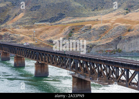 Canadian National railway bridge crossing the Thompson River south of Ashcroft in British Columbia Canada seen from the Rocky Mountaineer tourist trai Stock Photo