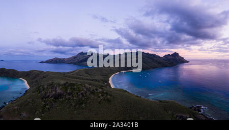 Dramatic aerial panorama of the sunset over the Waya island in the Yasawa group in Fiji, in the south Pacific ocean Stock Photo