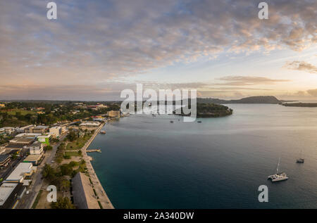 Aerial panorama of Port Vila city and the Iririki island in Vanuatu capital city at sunset. Stock Photo